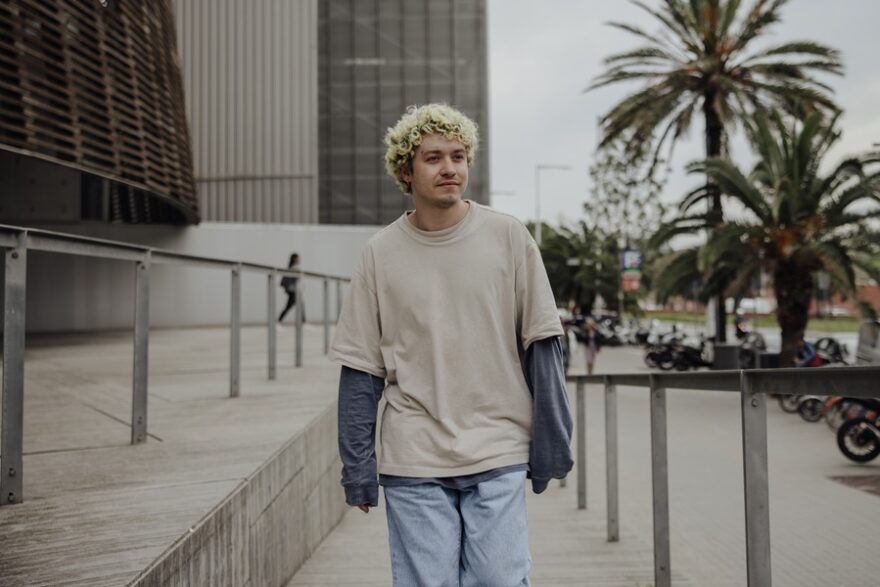 view-stylish-man-walking-city